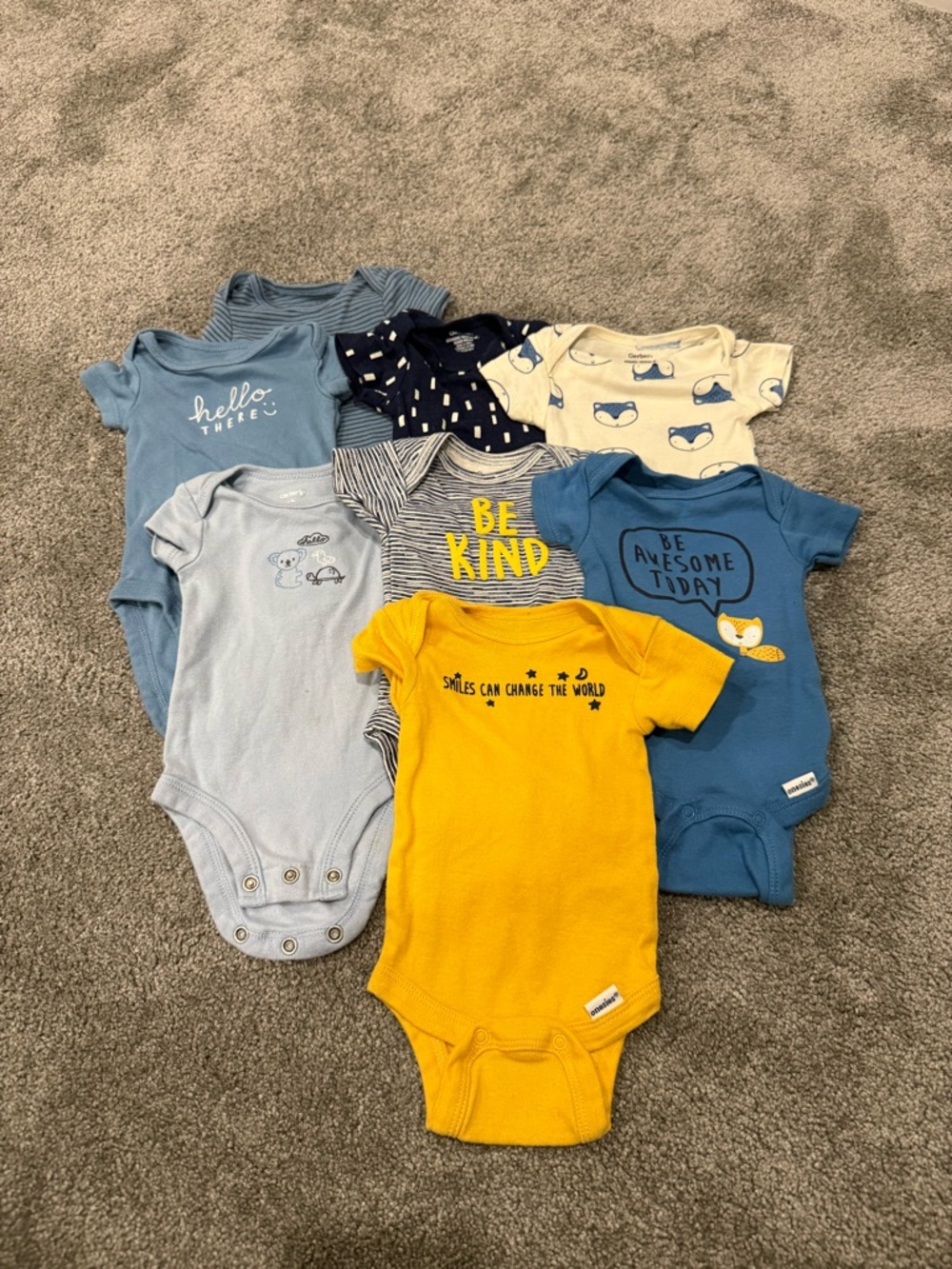 8 Newborn Baby Onesies, 5 Gerber and 3 Carter